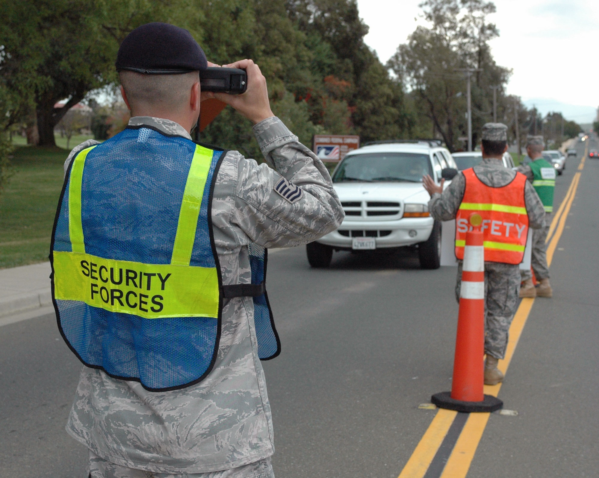 Tech. Sgt. Jason Kornelis, 60th Security Forces Squadron Police Services, observes vehicle speeds using Light Detection and Ranging. In addition to having the ability to single out one vehicle from a group, LIDAR also measures vehicle speed from a greater distance at a faster rate than the traditional radar devices. (U.S. Air Force photo/Senior Airman Kristen Rohrer)