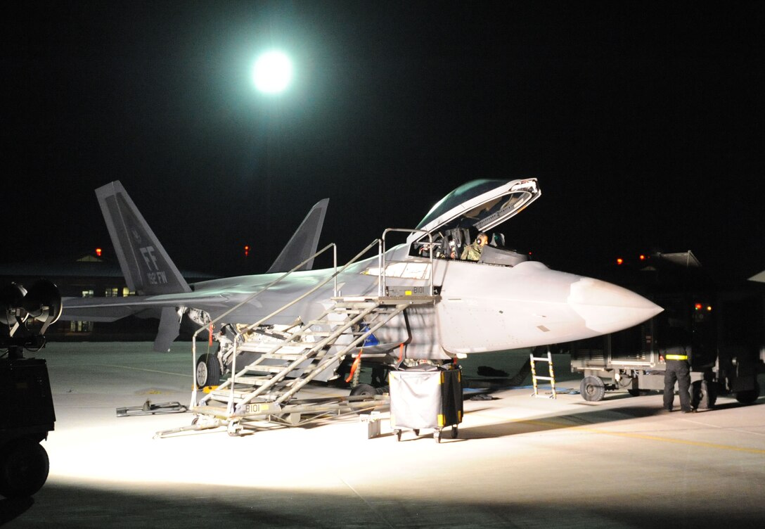 LANGLEY AIR FORCE BASE, Va. -- Langley Airmen prepare an F-22A Raptor Nov. 4 for a deployment to United Arab Emirates.  Six 1st Fighter Wing F-22A Raptors are participating in bilateral training with Coalition partners from Nov. 15 to Dec. 10.  (US Air Force Photo/Airman Rebecca Montez)