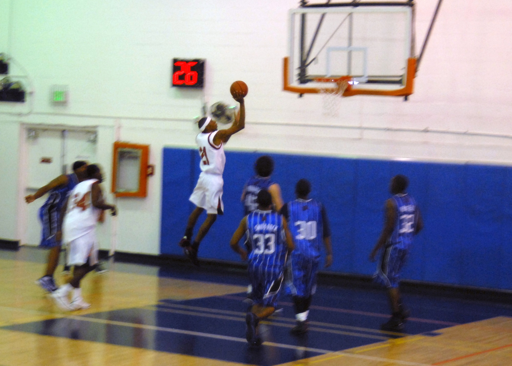 Sedric Whitaker, Edwards power foward, goes for a lay-up during a game against Travis Oct. 14. The game was held as part of Pacific West Military Athletic Conference basketball for the West Division, at the Rosburg Fitness Center. Edwards won the game 105-102. (Air Force photo/Airman 1st Class William O'Brien)
