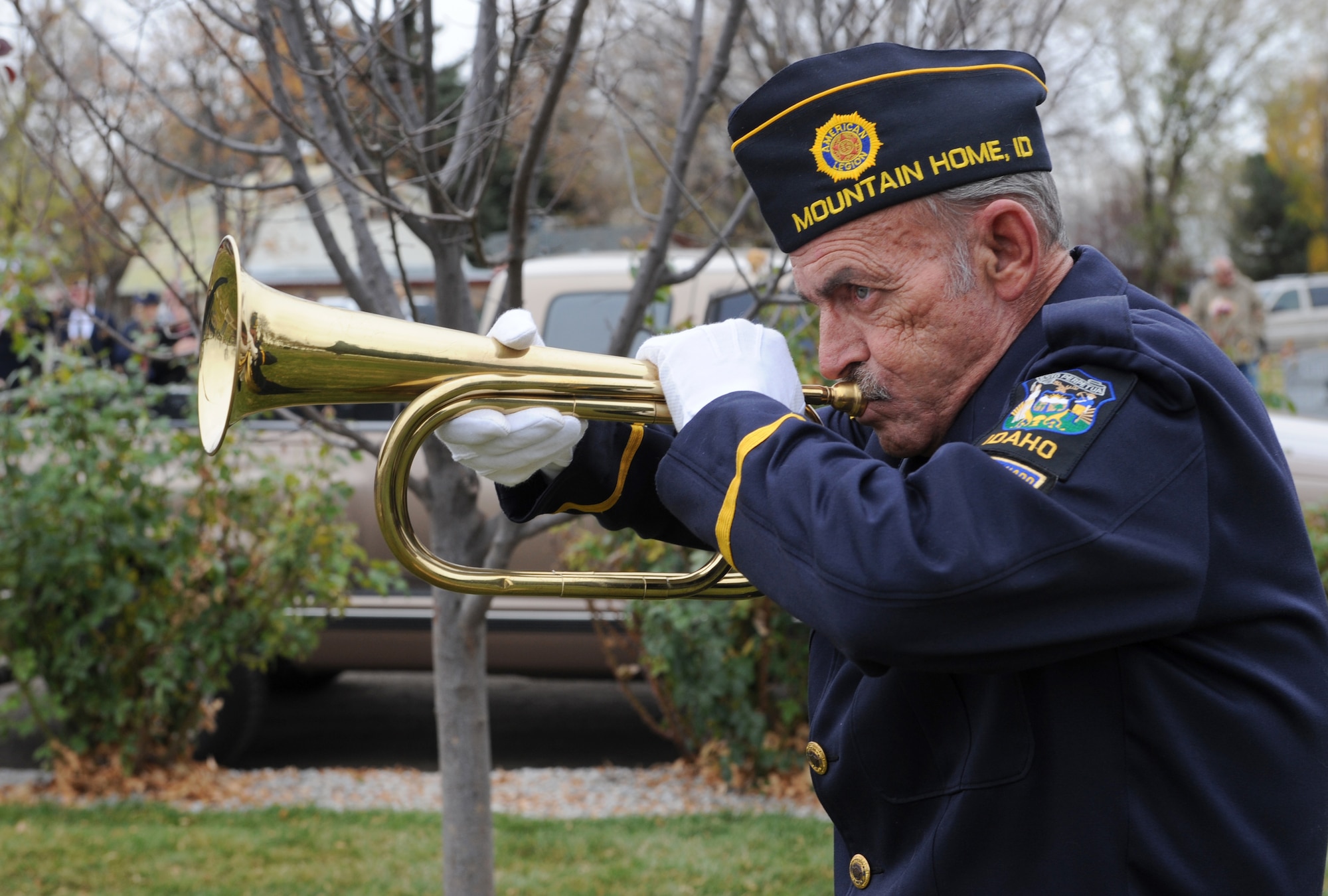MOUNTAIN HOME AIR FORCE BASE, Idaho - Jack Schafhausen, American Legion Post 26 Honor Guard member, plays taps during a Veteran's Day ceremony at the Mountain View Cemetery in Mountain Home Nov. 11. On the eleventh day of the eleventh month at the eleventh hour a ceremony is held to remember when World War I ended and also to pay respect to all veterans. Idaho has the largest percentage of veterans by population in the nation. (U.S. Air Force photo/ Airman Debbie Lockhart)