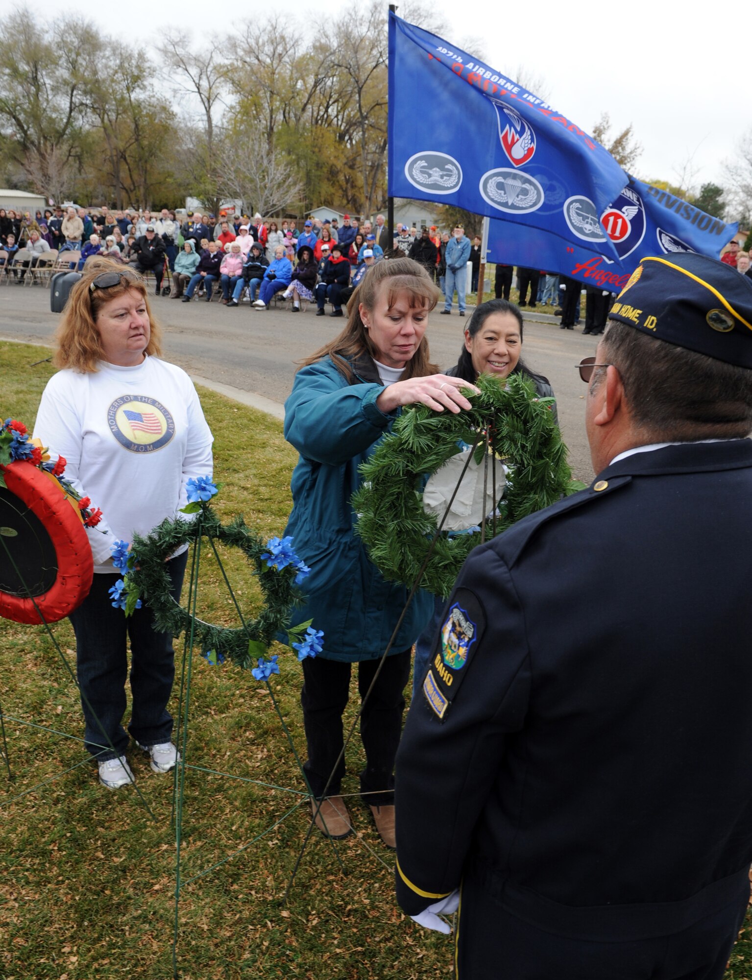 MOUNTAIN HOME AIR FORCE BASE, Idaho - Members of Idaho Mothers of the Military present a wreath during a Veteran's Day ceremony at the Mountain View Cemetery in Mountain Home, Nov. 11. On the eleventh day of the eleventh month at the eleventh hour a ceremony is held to remember when World War I ended and also to pay respect to all veterans. Idaho has the largest percentage of veterans by population in the nation. (U.S. Air Force photo/ Airman Debbie Lockhart)