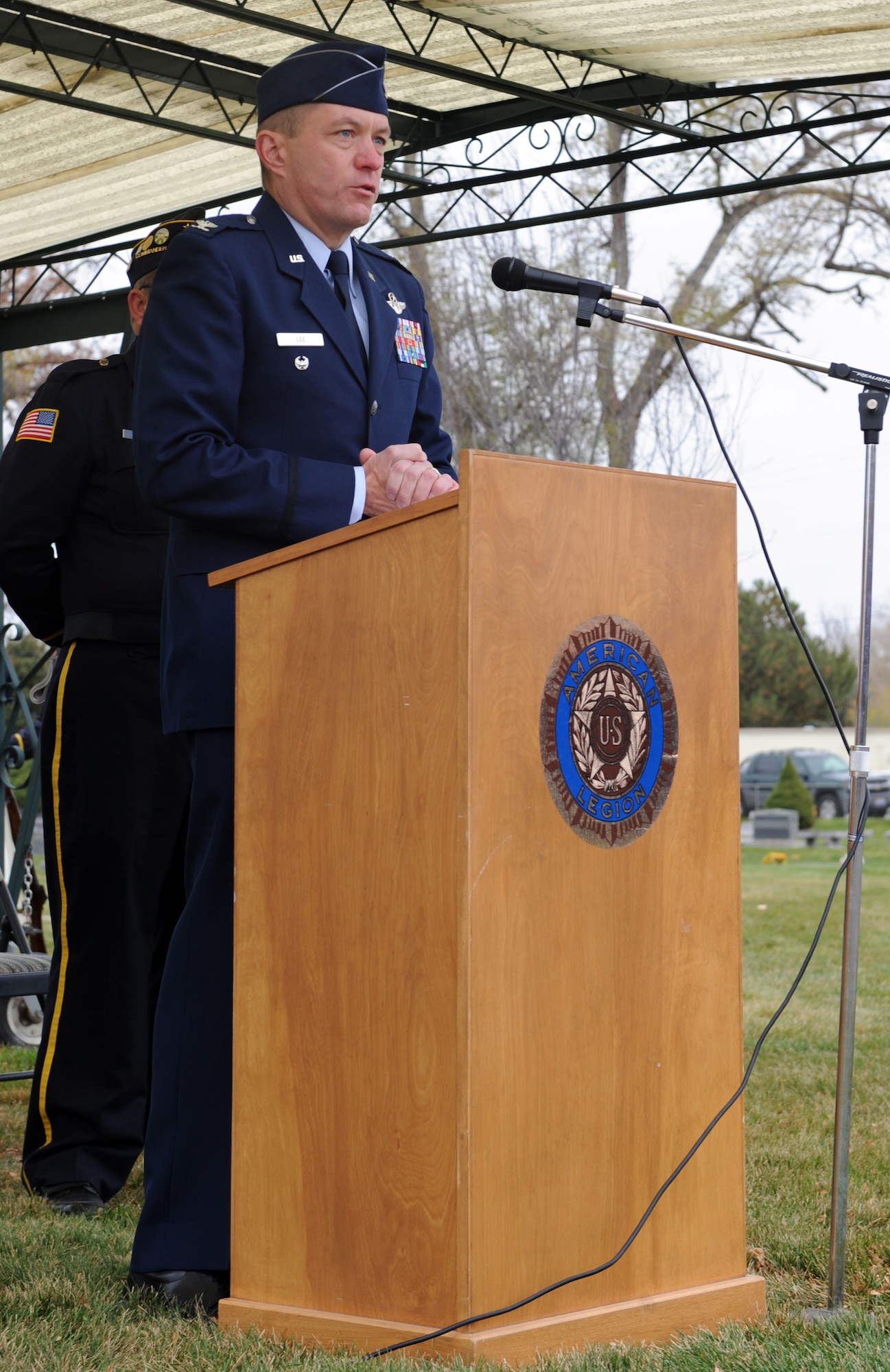 MOUNTAIN HOME AIR FORCE BASE, Idaho - Airmen and members of the Republic of Singapore air force stand at parade rest during a Veteran's Day ceremony at the Mountain View Cemetery in Mountain Home, Nov. 11. On the eleventh day of the eleventh month at the eleventh hour a ceremony is held to remember when World War I ended and also to pay respect to all veterans. Idaho has the largest percentage of veterans by population in the nation. (U.S. Air Force photo/ Airman Debbie Lockhart)
