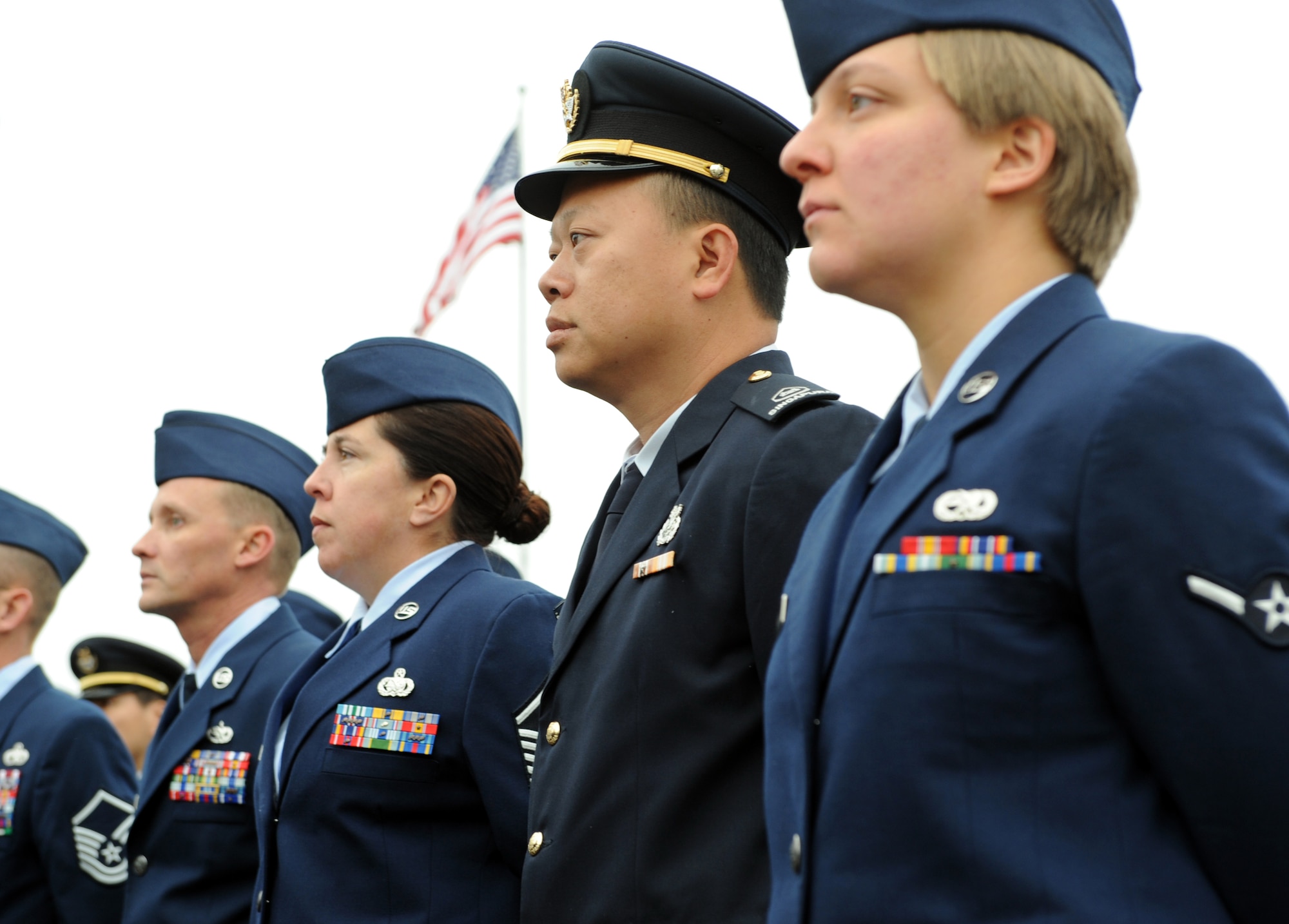 MOUNTAIN HOME AIR FORCE BASE, Idaho - Airmen and members of the Republic of Singapore air force stand at parade rest during a Veteran's Day ceremony at the Mountain View Cemetery in Mountain Home, Nov. 11. On the eleventh day of the eleventh month at the eleventh hour a ceremony is held to remember when World War I ended and also to pay respect to all veterans. Idaho has the largest percentage of veterans by population in the nation. (U.S. Air Force photo/ Airman Debbie Lockhart)