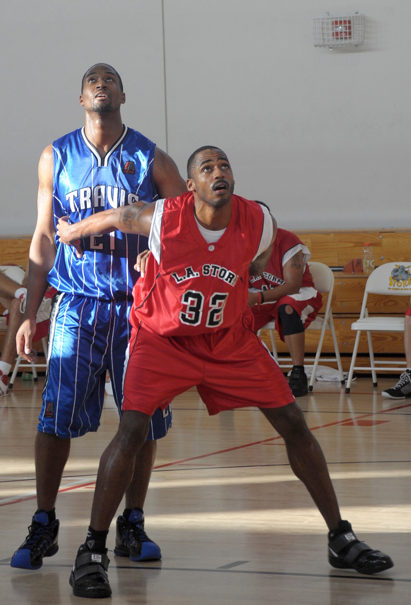 Staff Sgt. Michael Evans (right), Space and Missile Systems Center Safety Office, boxes a defender from Travis Air Force Base during the championship game. Los Angeles AFB sponsored the 2009 Veterans Day "SoCal Shootout" Basketball Tournament on Nov. 7 and 8, which included participation from Luke AFB, Travis AFB, Vandenberg AFB, and Edwards AFB. The LA Storm won the championship title with an 80 to 77 victory over Travis. (Photo by Atiba Copeland)