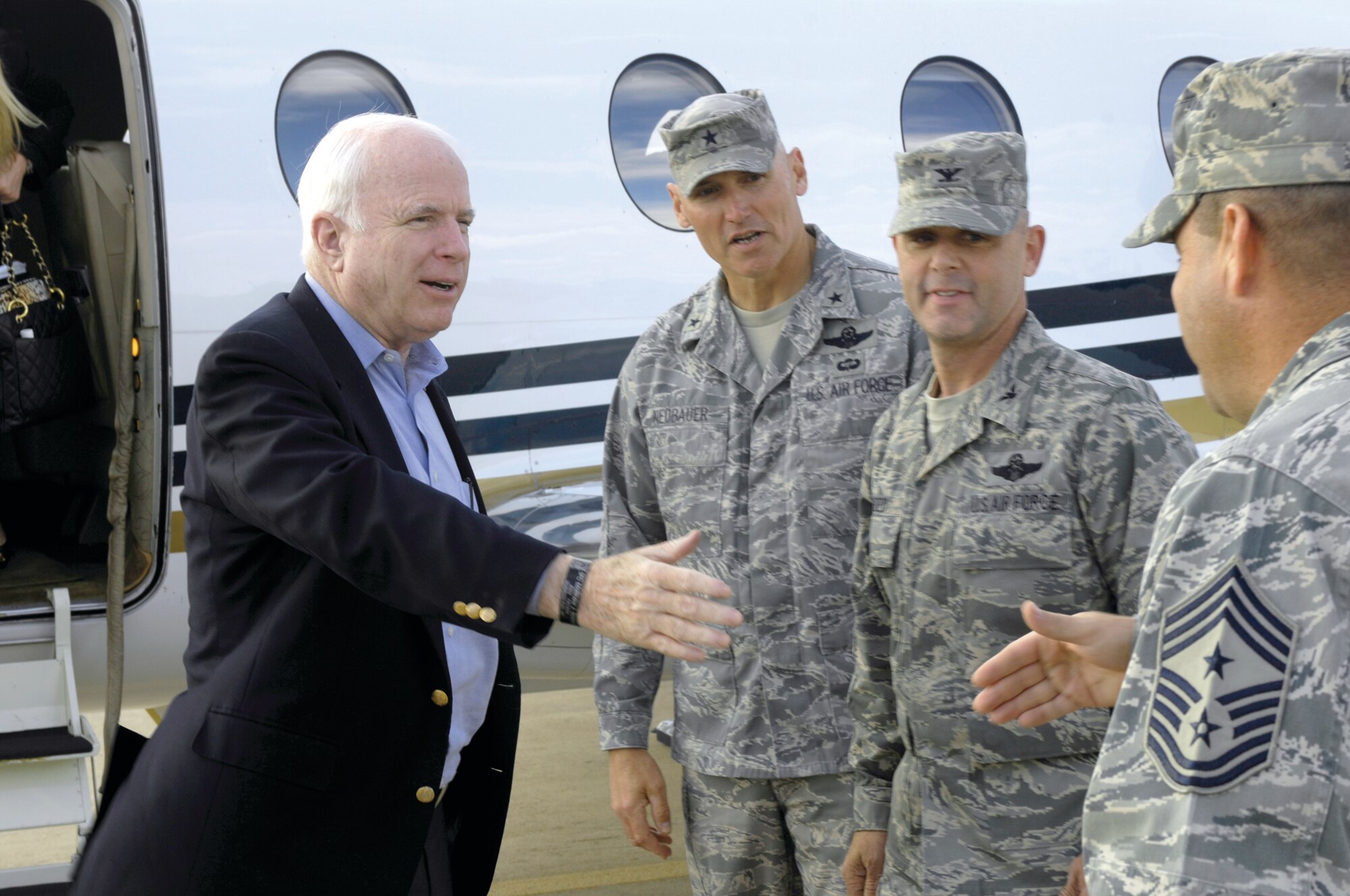 U.S. Senator John McCain greets top 56th Fighter Wing leaders on the flightline at Luke Air Force Base, Arizona, Nov 13, 2009. Sen. McCain visited Luke and held a press conference to discuss the future of the base and his support of it.(U.S. Air Force Photo by Staff Sgt. Jason Colbert)