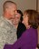 SrA Jeremy Hayes reunites with his mother (retired Chief Sheila Hunsucker 184 IW) and wife at McConnell AFB, KS on November 16, 2009.  SrA Hayes is part of the 184 SFS and was deployed for 8 months to Southwest Asia.