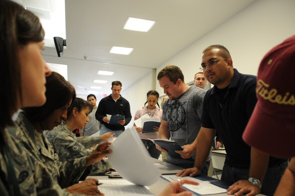 Individual Ready Reserve members process through a line for a muster call at MacDill Air Force Base (U.S. Air Force Photo/Capt. Shane Huff)