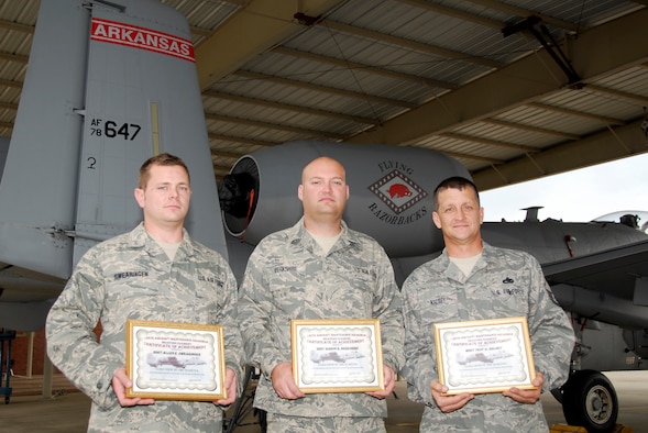 From left: Staff Sgt. Allen Swearingen, Staff Sgt. Aaron Berkshire and Master Sgt. Troy Halsey. The trio poses in front of an A-10 Thunderbolt II "Warthog" with individual certificates earned for its collective achievement as the 188th Fighter Wing Maintenance Squadron's Load Crew of the Quarter for the third quarter of 2009. The trio was recognized during a Unit Training Assembly Nov. 7, 2009. (U.S. Air Force photo by Senior Master Sgt. Dennis Brambl/188th Fighter Wing Public Affairs)