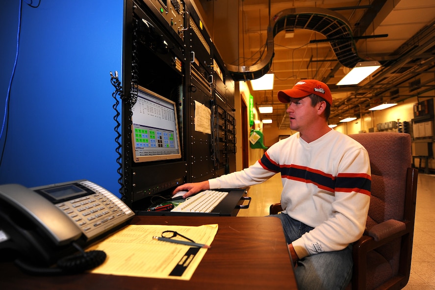OFFUTT AIR FORCE BASE, Neb. -- Brady Bach, a telecommunications specialist with the 55th Strategic Communications Squadron, monitors the antennas at the Elkhorn and Scribner Communicaton sites Nov. 5 from a detached facility located near Elkhorn, Neb. The communication sites support a wide variety of missions from executive levels of government to the National Aeronautics and Space Administration. (U.S. Air Force photo/Josh Plueger)
