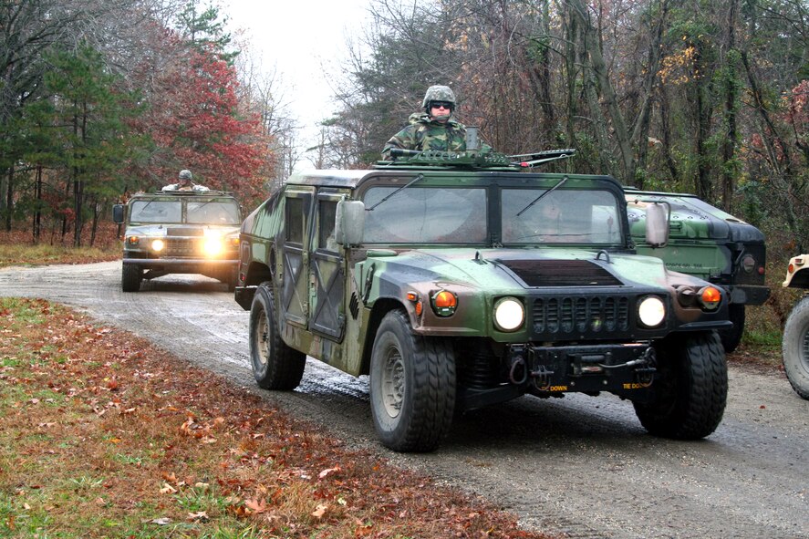 Students in the Combat Airman Skills Training Course 10-1A move out for mounted patrol, or convoy operations, training during a course session on Nov. 12, 2009, on a range at Joint Base McGuire-Dix-Lakehurst, N.J. The course, taught by the U.S. Air Force Expeditionary Center's 421st Combat Training Squadron, prepares Airmen for upcoming deployments. (U.S. Air Force Photo/Tech. Sgt. Scott T. Sturkol)