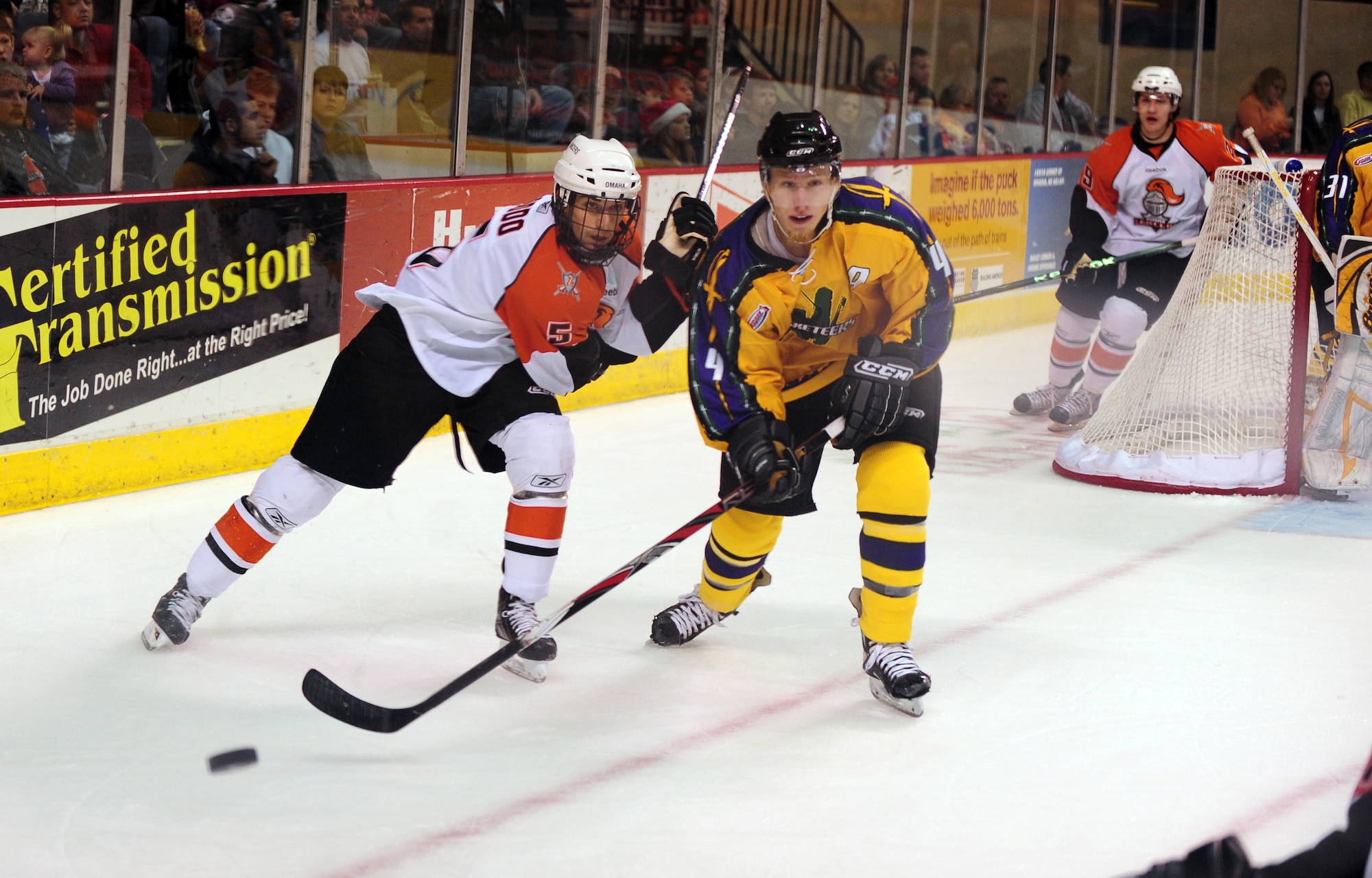 OFFUTT AIR FORCE BASE, Neb. - Nick Oddo, forward with the Omaha Lancers, fights for the puck with Danny Wurden, Sioux City Musketeers, during the Lancers military appreciation game at the Civic Auditorium Nov. 13 in Omaha, Neb. Mr. Oddo later scored the first goal of the night for the Lancers with three minutes and 36 seconds left in the first period. The Lancers won the game defeating the Musketeers 3 - 2 earning their 13th win of the season. Throughout the week of Veterans Day numerous organizations and businesses paid special tribute to the men and women of our nation's armed forces.

U.S. Air Force photo by Josh Plueger
