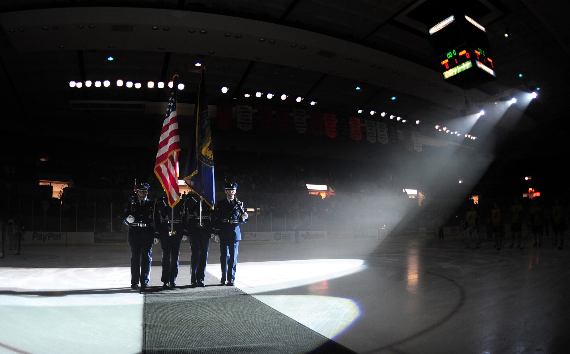OFFUTT AIR FORCE BASE, Neb. - The 55th Wing Honor Guard present the colors to start the military appreciation night hockey game between the Omaha Lancers and the Sioux City Musketeers Nov. 13 at the Civic Auditorium in Omaha, Neb.  Throughout the week of Veterans Day numerous organizations paid special tribute to the men and women of America's armed forces. U.S. Air Force photo by Josh Plueger

