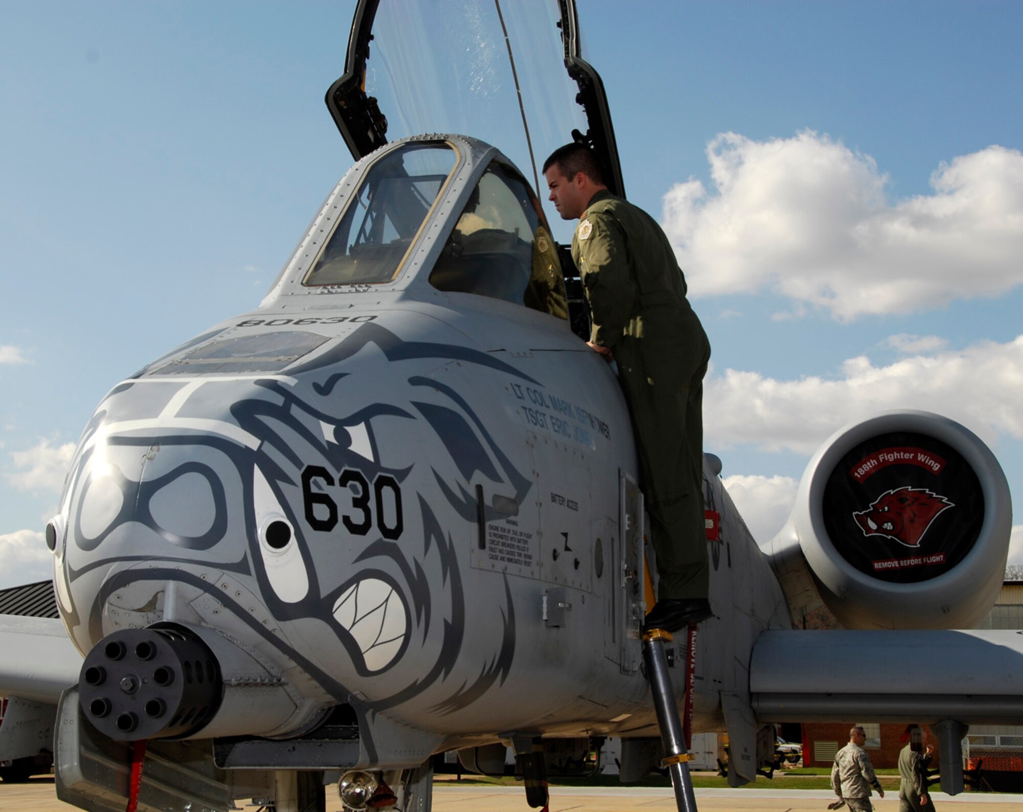 Maj. Jay Spohn, an A-10 Thunderbolt II "Warthog" pilot with the 188th Fighter Wing Arkansas Air National Guard, based in Fort Smith, Ark., prepares an A-10 for a photo shoot following a press conference held at the 188th Nov. 10, 2009. Spohn was the only Air National Guard pilot to be selected to fly the F-35 Lightning II Joint Strike Fighter in the program's initial cadre. (U.S. Air Force photo by Senior Master Sgt. Dennis Brambl/188th Fighter Wing Public Affairs)