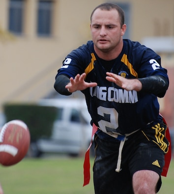 Team King Comm quarterback Randy McGinnis waits for the ball during the U.S. Air Forces in Europe Flag Football Championship in Camp Darby, Italy, Nov. 12 through 16. The 86th Communications Squadron football team won the championship 20-19 in double overtime against the Camp Darby team. (Photo by Joyce Costello, courtesy of the U.S. Army)