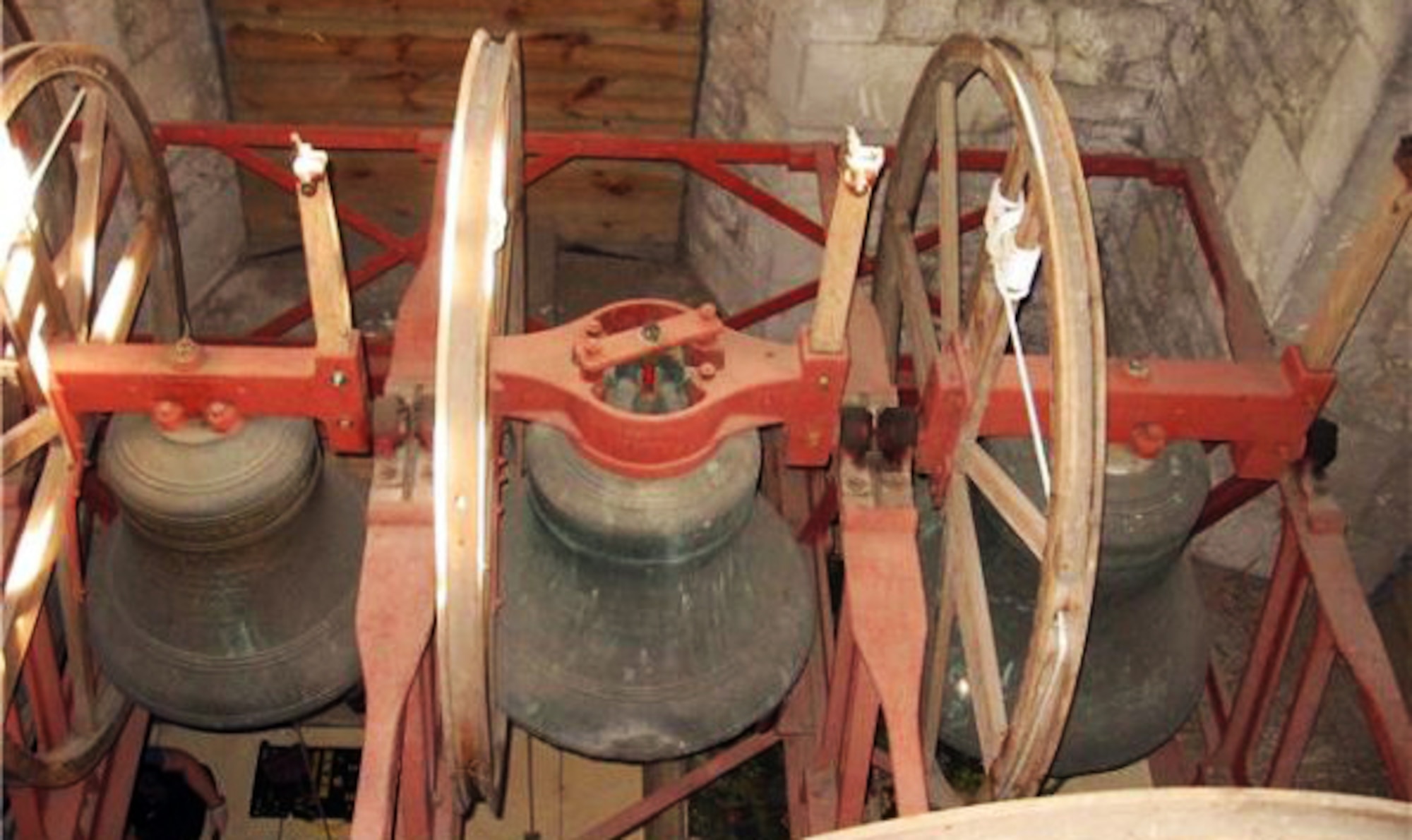 Most of the local Church of England village churches were built in the 1400s, and most had a set of bells like the ones shown here.  By the 1700s, bands of bell ringers had developed various patterns that could be rung on their church bells. (U.S. Air Force photo) 