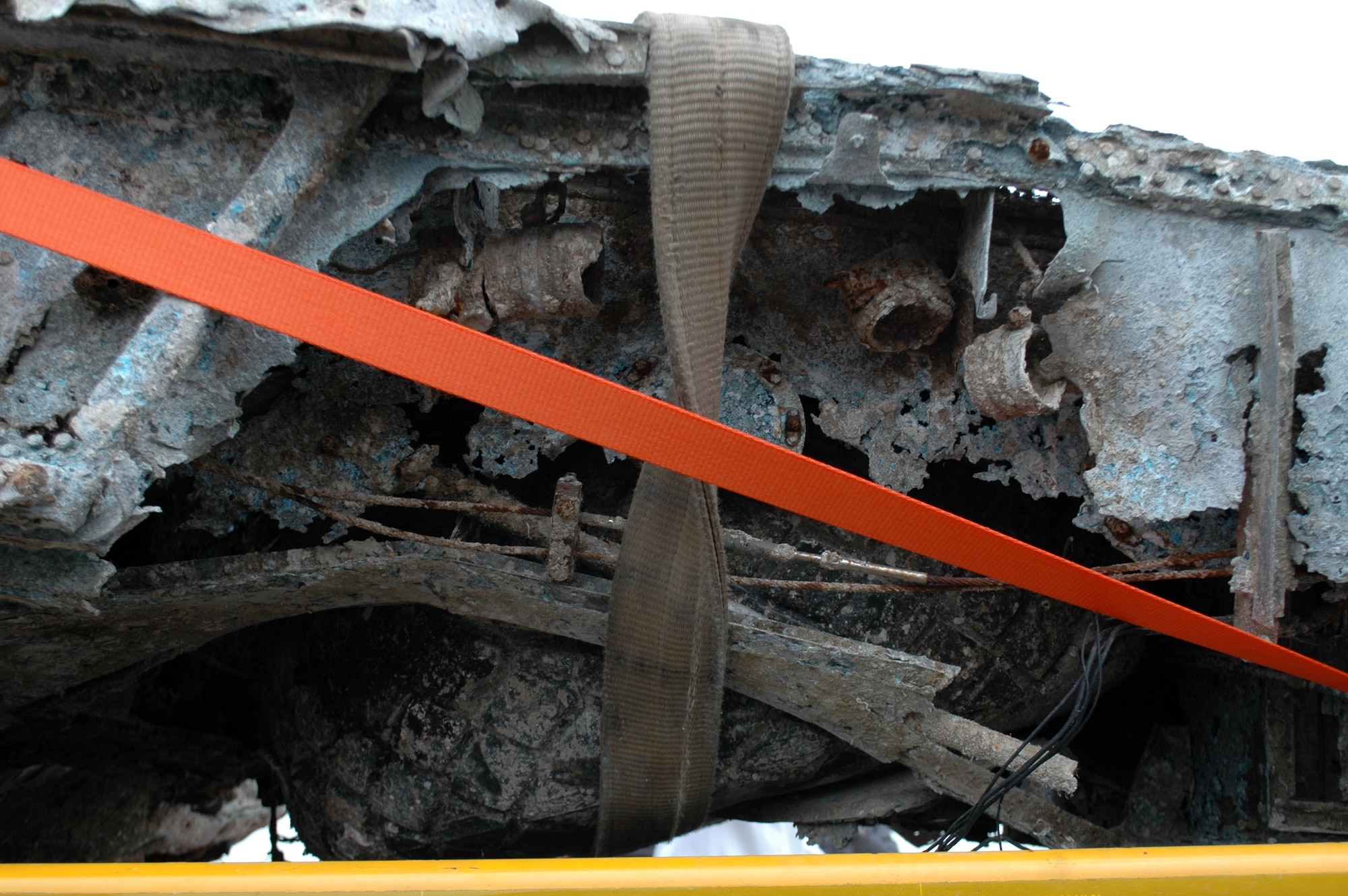 A wreckage believed to be that of a P-47 Thunderbolt was recovered from the bottom of the Adriatic Sea May 12, 2009 by an Italian fishing boat crew.  An Italian aero club signed for the wreckage during a Nov. 14, 2009 ceremony in Chioggia, Italy and hope to recover a serial number from the landging gear during their restoration project expected to take two years.  The serial number is a key to Air Force historians so they can trace the aircraft to a specific unit and in identifying who was piloting the aircraft the day it crashed.  (U.S. Air Force photo/Tech. Sgt. Michael O'Connor)