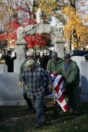 NEW YORK -- The formerly oldest living female Marine, Miriam Cohen, is brought to her grave site, Nov. 17, in Cypress Hills National Cemetery. The 101-year-old Cohen enlisted in the Marine Corps during World War II and again during the Korean War. She was the oldest female enlistee of her time at 35 years old and was part of the first female Marine recruit class. (Official Marine Corps photo by Sgt. Randall A. Clinton)