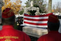 NEW YORK -- An Army soldier folds an American Flag over the casket of the formerly oldest living female Marine, Miriam Cohen, who was buried Nov. 17, in Cypress Hills National Cemetery. The 101-year-old Cohen enlisted in the Marine Corps during World War II and again during the Korean War. She was the oldest female enlistee of her time at 35 years old and was part of the first female Marine recruit class. (Official Marine Corps photo by Sgt. Randall A. Clinton)
