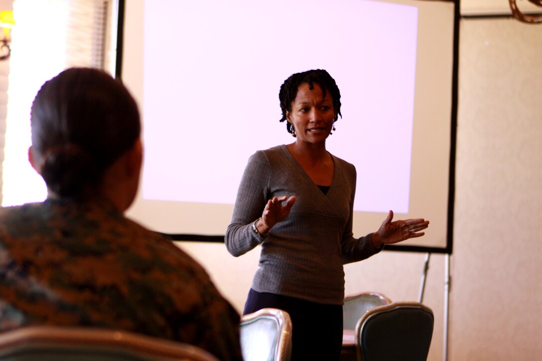Hollie D. Kelly, sexual assault response coordinator, Marine Corps Base Camp Pendleton, briefs a group of family readiness officers from various units at the Marine Corps Family Team Building Readiness Center, Nov. 17.