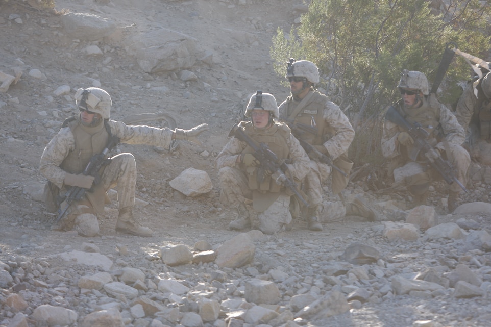 Marines with Company I, 3rd Battalion, 7th Marine Regiment, stack up and wait as a breech is prepared at the Combat Center’s Range 410A Nov. 19. The company undertook platoon-level exercises as part of its pre deployment training process.