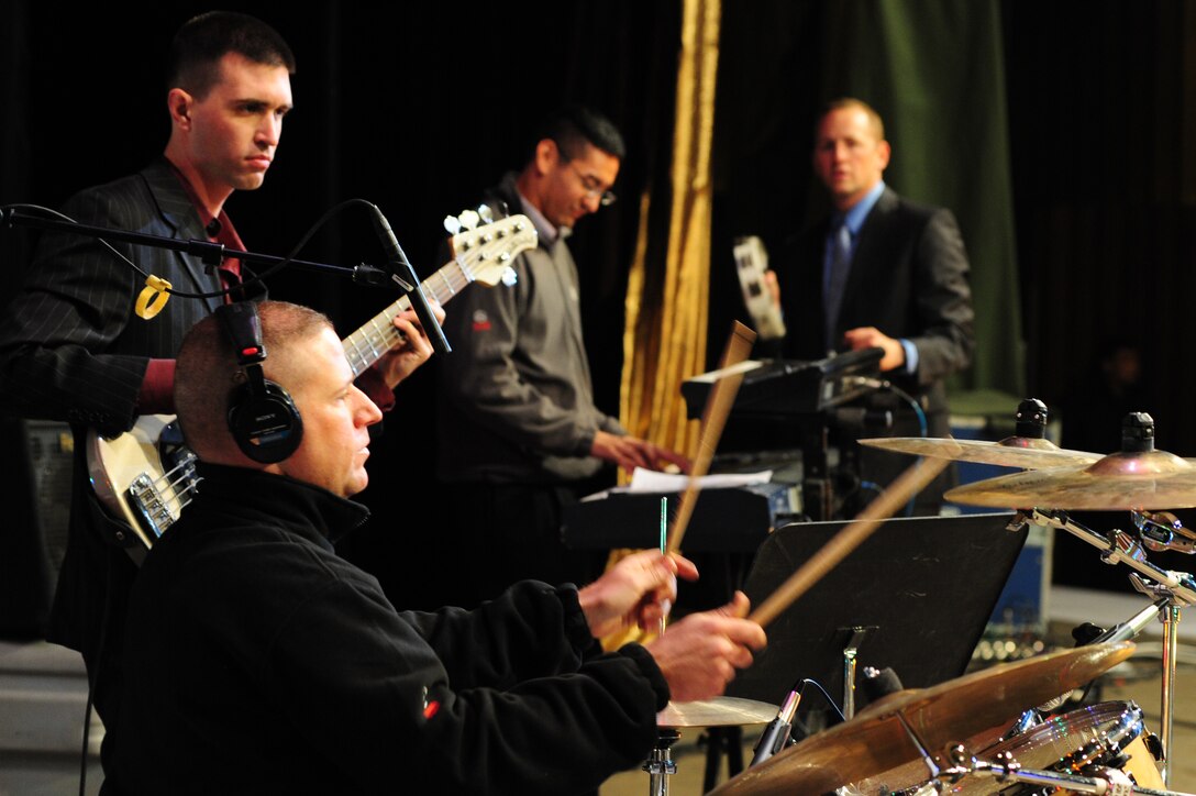 BISHKEK, Kyrgyzstan -- U.S. Air Forces Central Sirocco Band artists perform at the Palace of Sport, Nov. 16, 2009. The Sirocco Band performed for several hundred audience members at the palace. Sirocco members are stationed at a base in Southwest Asia and are deployed from Lackland Air Force Base, Texas. (U.S. Air Force photo/Senior Airman Steele C. G. Britton)