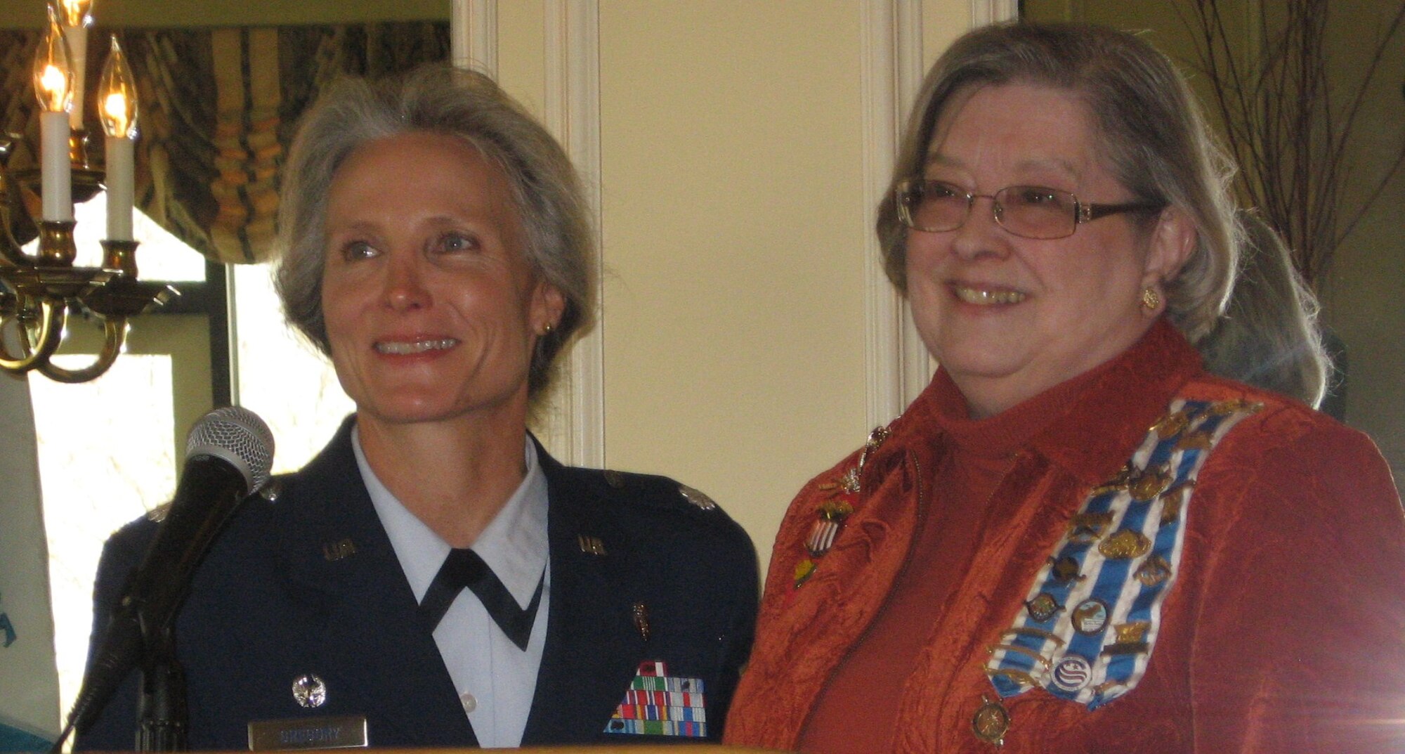 Lt. Col. Bridget Gregory, 82nd Aeromedical Squadron commander, and Daughters of the American Revolution Francis Grice Chapter Regent, Rose Van Meter, address final questions from the assembly at the Wichita Country Club monthly meeting Nov. 14.  Lt. Col. Gregory provided an insightful presentation on life in the military with her own experiences as a veterinarian and aerospace medical squadron commander. (U.S. Air Force photo/Airman 1st Class Valerie) 