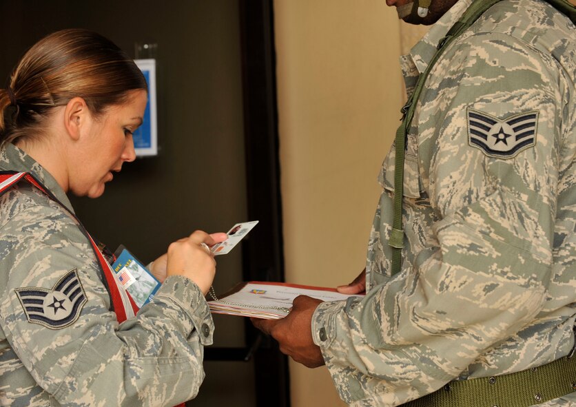 MOODY AIR FORCE BASE, Ga. -- Staff Sgt. Rachael Stanchak, 23rd Force Support Squadron, cross checks ID cards with dog tags during the Phase I Operational Readiness Exercise here Nov. 18. (U.S. Air Force photo by Senior Airman Schelli Jones)