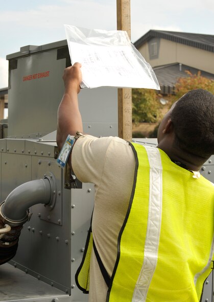 MOODY AIR FORCE BASE, Ga. -- Airman 1st Class Mitchell Sterling, 23rd Logistics Readiness Squadron traffic management apprentice, measures the height of a piece of equipment during the Phase I Operational Readiness Exercise here Nov. 18. Accurate weight measurement is critical for all cargo that is loaded onto aircraft. (U.S. Air Force photo by Senior Airman Schelli Jones)