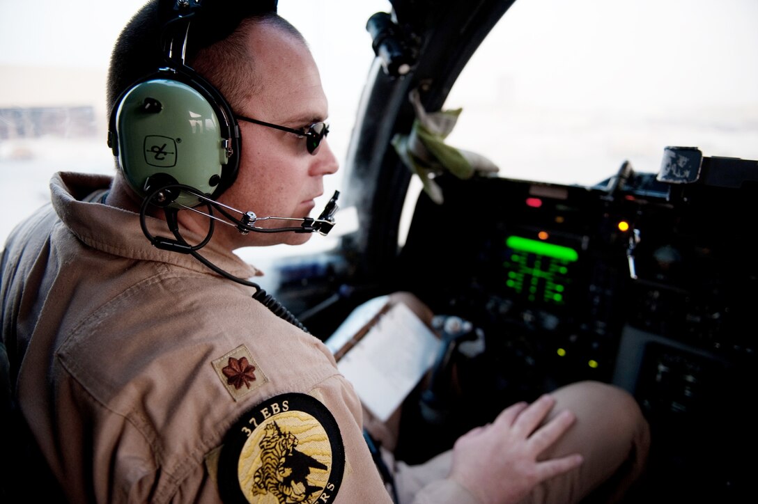 Maj. Andrew Kowalchuk, 37th Expeditionary Bomb Squadron pilot, performs preflight checks on a B-1B Lancer Nov. 11, 2009, at an air base in Southwest Asia. Major Kowalchuk is deployed from Ellsworth Air Force Base, S.D. (U.S. Air Force photo/Staff Sgt. Robert Barney)