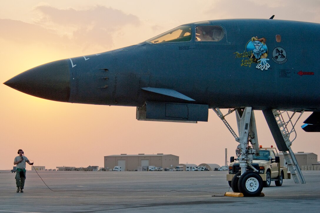 Tech. Sgt. Shaun Carroll performs preflight checks on a B-1B Lancer Nov. 11, 2009, in Southwest Asia. Sergeant Carroll is with the 37th Aircraft Maintenance Unit and deployed with the aircraft from Ellsworth Air Force Base, S.D. (U.S. Air Force photo/Staff Sgt. Robert Barney)