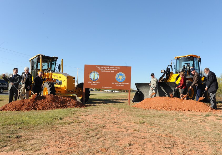 DYESS AIR FORCE BASE, Texas -- Texas Representative Susan King and distinguished visitors break ground at the future home of the Armed Forces Reserve Center here, Nov. 16. The AFRC will centralize Army Reserve and Army National Guard Reserve Centers in the surrounding areas. (U.S Air Force photo/Senior Airman Jenifer H. Calhoun)
