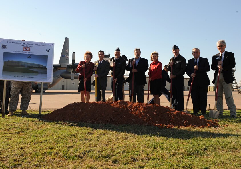 DYESS AIR FORCE BASE, Texas -- (center) Senator Kay Bailey Hutchison, (left) Texas Representative Susan King and distinguished visitors break ground for the construction of the C-130J Multipurpose Maintenance Hangar here, Nov. 16. The hangar will include fire wall separation between bays and appropriate ventilation systems to accommodate fuel systems maintenance in addition to general aircraft maintenance. The hangar is sized to accommodate two C-130Js or one B-1 Bomber. (U.S Air Force photo/Senior Airman Jenifer H. Calhoun)