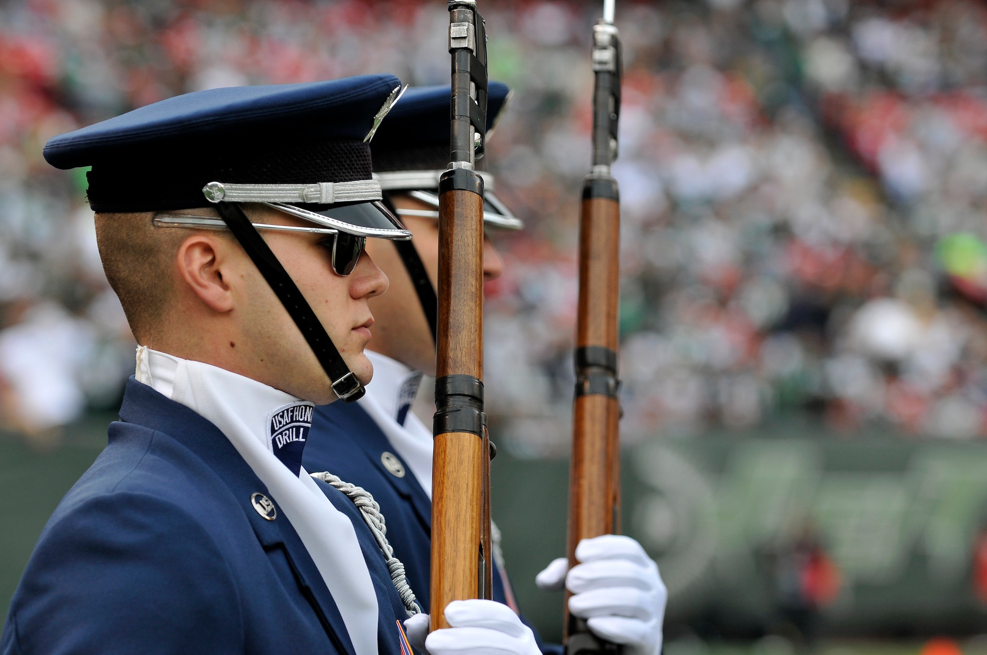 Airman 1st Class Michael Courtright, United States Air Force Honor Guard Drill Team, marches onto the field to perform during the halftime show at a New York Jets football game against the Jacksonville Jaguars at Giants Stadium Nov. 15, in East Rutherford, New Jersey. The Drill Team tours worldwide representing all Airmen while showcasing Air Force precision and professionalism. During the Air Force Honor Guard's 60-year history, their traveling component, the Drill Team, has performed in every state of the union and many countries abroad. (U.S. Air Force photo/Senior Airman Marleah Miller)