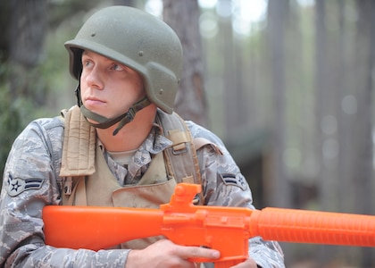 Airman 1st Class Chris Mcmillan listens to an expeditionary combat skills training instructor on Charleston AFB, Nov. 17. There are 26 courses that Airmen go through during ECST. Airman Mcmillan is a life support technician with the 437th Operations Support Squadron. (U.S. Air Force photo/Senior Airman Katie Gieratz)(RELEASED)