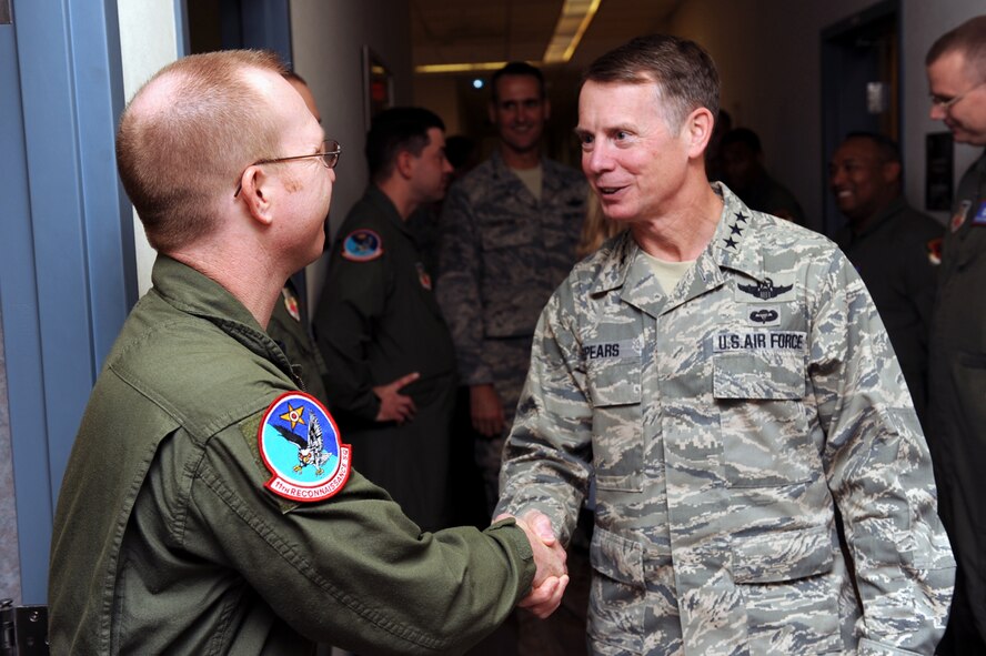 CREECH AIR FORCE BASE, Nev. -- Lieutenant General Glenn Spears, 12th Air Force commander, is greeted by Master Sgt. Kelly Clark, 11th Reconnaissance Squadron, Nov. 13. The 11 RS is the United States Air Force's first and premiere MQ-1B Predator formal training unit that conducts five basic and advanced training courses: Initial Qualification (IQT), Instructor Upgrade Training (IUT), Foreign Officer Course (FOC), Senior Officer Course (SOC), and Launch & Recovery Course (LR) (U.S. Air Force photo by Airman 1st Class Brett Clashman)