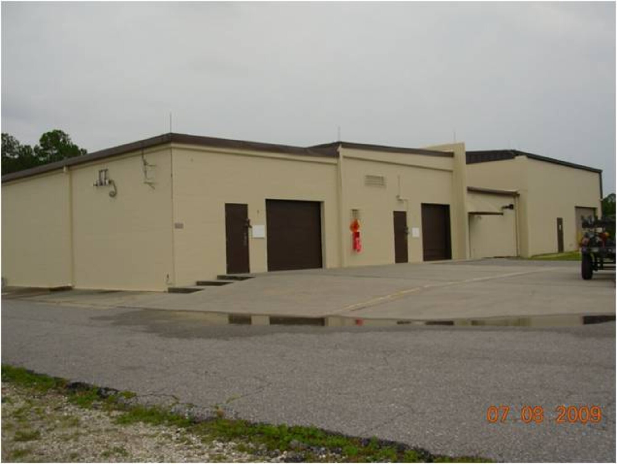 Tyndall spent $65,300 of the Recovery and Reinvestment Act money on repainting the munitions building. Both exterior and interior surfaces were painted including walls, fascia trim, roll-up/regular doors, downspouts and the interior bays. Tyndall received $23.3 million in 2009 as part of the Recovery and Reinvestment Act, a stimulus package signed by President Barack Obama on Feb 17 to jumpstart the American economy.   (U.S. Air Force courtesy photo)
