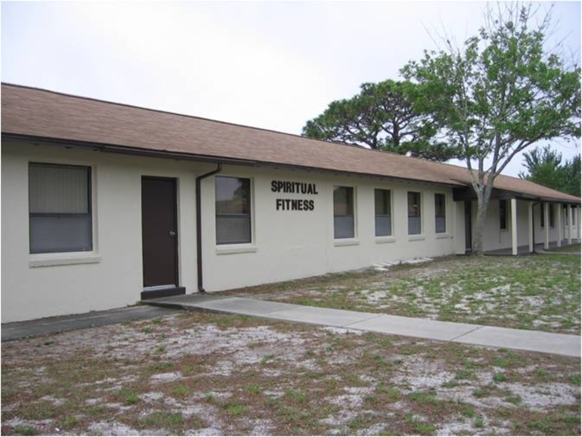 AFTER: The exterior the Chapel Annex including walls, fascia trim, doors and downspouts was repainted at a cost of $34,900. The money was part of the $23.3 million Tyndall received in 2009 as part of the Recovery and Reinvestment Act, a stimulus package signed by President Barack Obama on Feb 17 to jumpstart the American economy.   (U.S. Air Force courtesy photo)