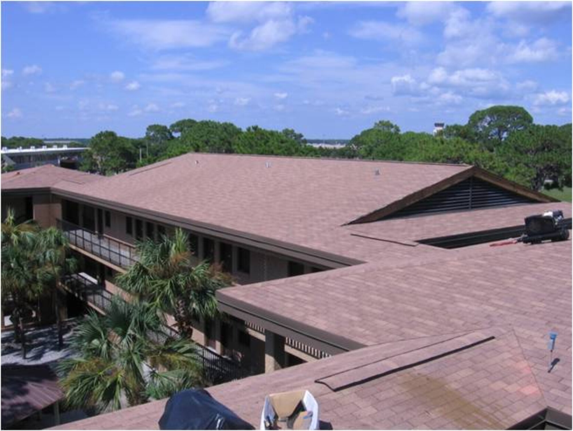 AFTER: Four base dormitories received new, energy efficient, shingle roofing systems at a cost of $305,400. The money was part of the $23.3 million Tyndall received in 2009 as part of the Recovery and Reinvestment Act, a stimulus package signed by President Barack Obama on Feb 17 to jumpstart the American economy.  (U.S. Air Force courtesy photo) 