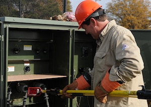 LANGLEY AIR FORCE BASE, Va. --  Rick Minks, 1st Civil Engineer Squadron Electrical Systems technician, tests the high-voltage side of the transformer Nov. 17.  Last week, a nor'easter struck Langley and damaged power lines.  (U.S. Air Force photo/Senior Airman Zachary Wolf) 