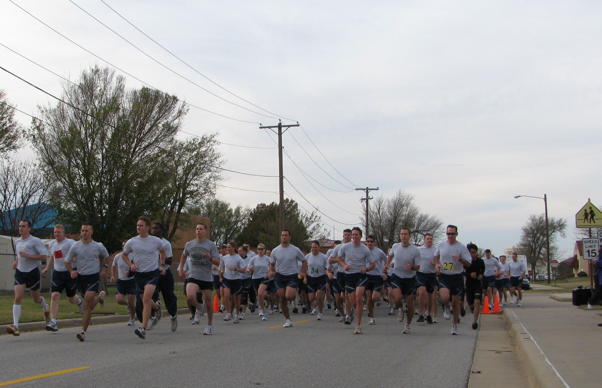 Runners take off at the starting line for the Commander’s 5K at the Vance AFB fitness center, Nov. 12, 2009. This year, there were 152 participants, almost double the amount from last year. Runners competed for first, second and third place to win points for the Commander’s Trophy. The 32nd Flying Training Squadron took first place for overall squadron, followed by the 71st Mission Support Group in second place and the 71st Operations Support Squadron in third place. (U.S. Air Force photo/ Jillian Moore) 