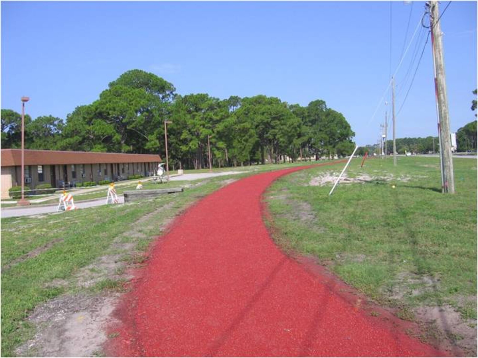 AFTER: Updates to Beacon Beach running track provide users with a more resilient athletic surface. The improvements cost $573,300 of the $23.3 million Tyndall received in 2009 as part of the Recovery and Reinvestment Act, a stimulus package signed by President Barack Obama on Feb 17 to jumpstart the American economy. (U.S. Air Force courtesy photo)