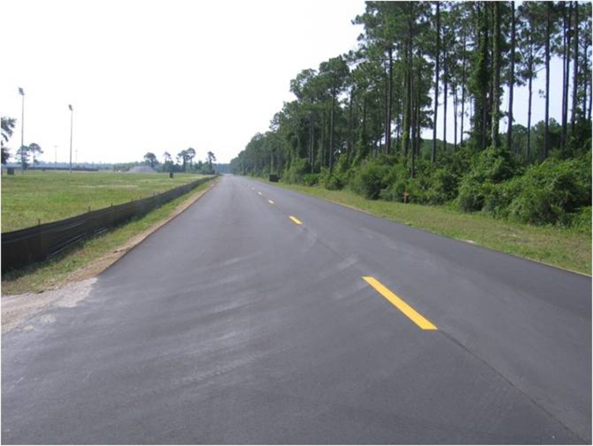 AFTER: This completed project had the existing asphalt removed and replaced by milling and overlay of new pavement material with a cost of $261,800. The money was part of the $23.3 million Tyndall received in 2009 as part of the Recovery and Reinvestment Act, a stimulus package signed by President Barack Obama on Feb 17 to jumpstart the American economy. (U.S. Air Force courtesy photo)