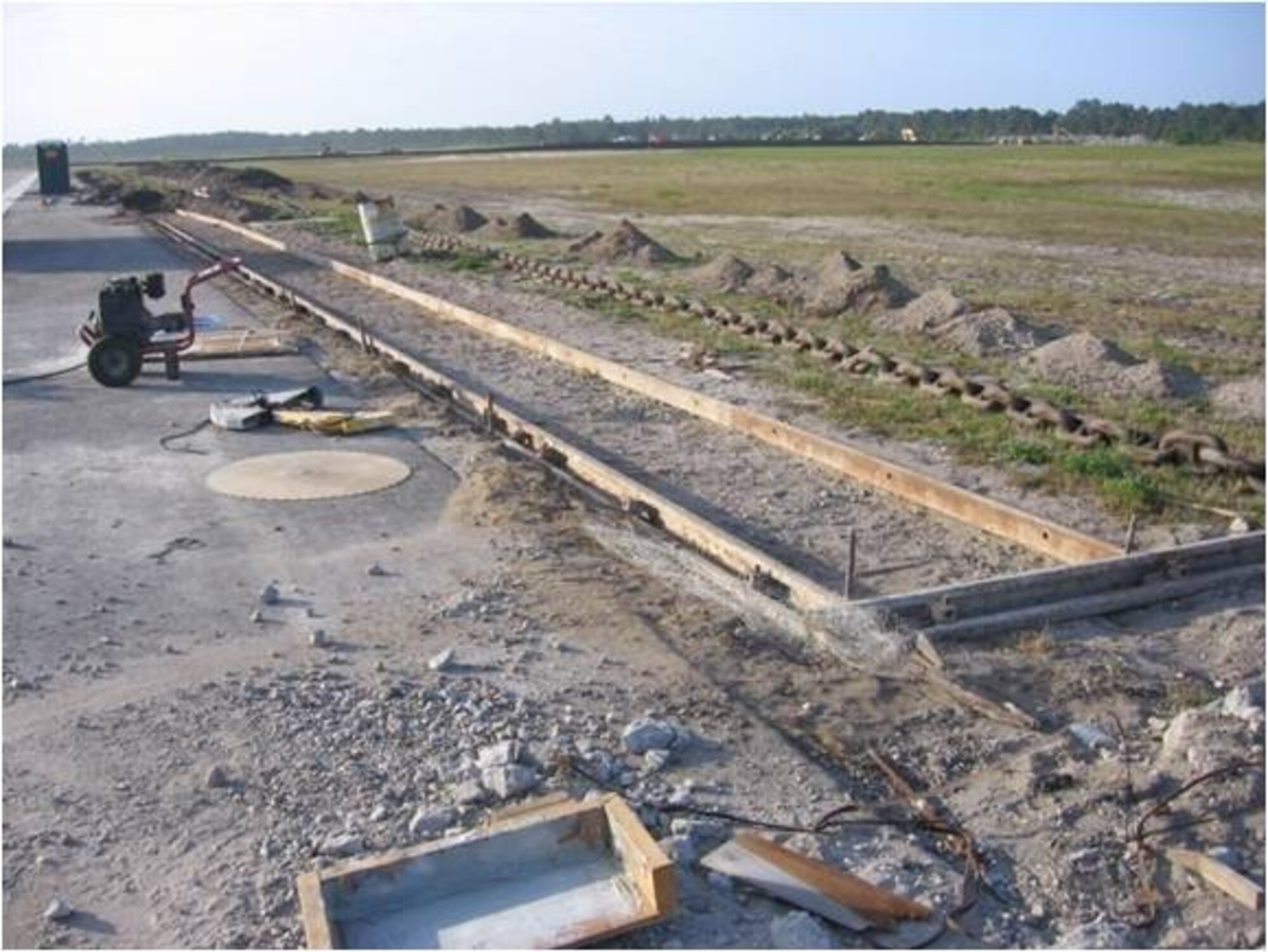 BEFORE: Tyndall spent $138,100 installing concrete support pads for aircraft arresting chains. This installation allowed the removal of an airfield waiver. The money was part of President Barack Obama’s Recovery and Reinvestment Act. Tyndall received $23.3 million in 2009 as part of the Recovery Act. (U.S. Air Force courtesy photo)