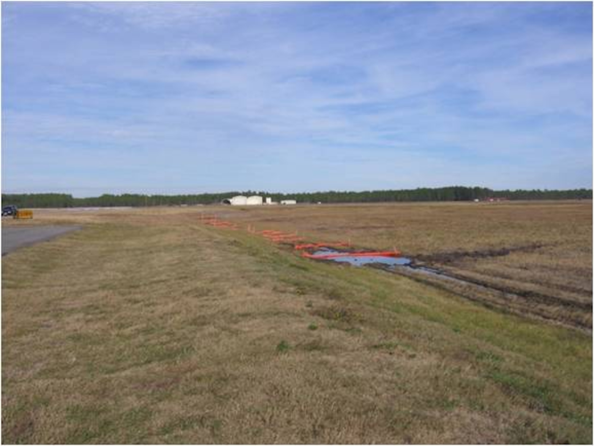 BEFORE:
This picture illustrates the east end of Tyndall’s airfield prior to the insertion of a $130.5 thousand drainage culvert funded by the Recovery and Reinvestment Act. Tyndall received $23.3 million in Recovery Act money in April. The act was part of the stimulus package signed by President Barack Obama on Feb. 17 to jumpstart the American economy. (U.S. Air Force courtesy photo)