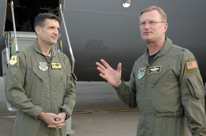 Brig. Gen. David Fadok, right, talks to Col. Joe Mancy after delivering Charleston AFB's newest C-17 Nov. 17. The new arrival is the last projected C-17 Charleston AFB is scheduled to receive. General Fadok is the director for Policy and Strategy, Headquarters U.S. Southern Command and Colonel Mancy is the 437th Operations Group commander.  (U.S. Air Force photo/Staff Sgt. Marie Brown)