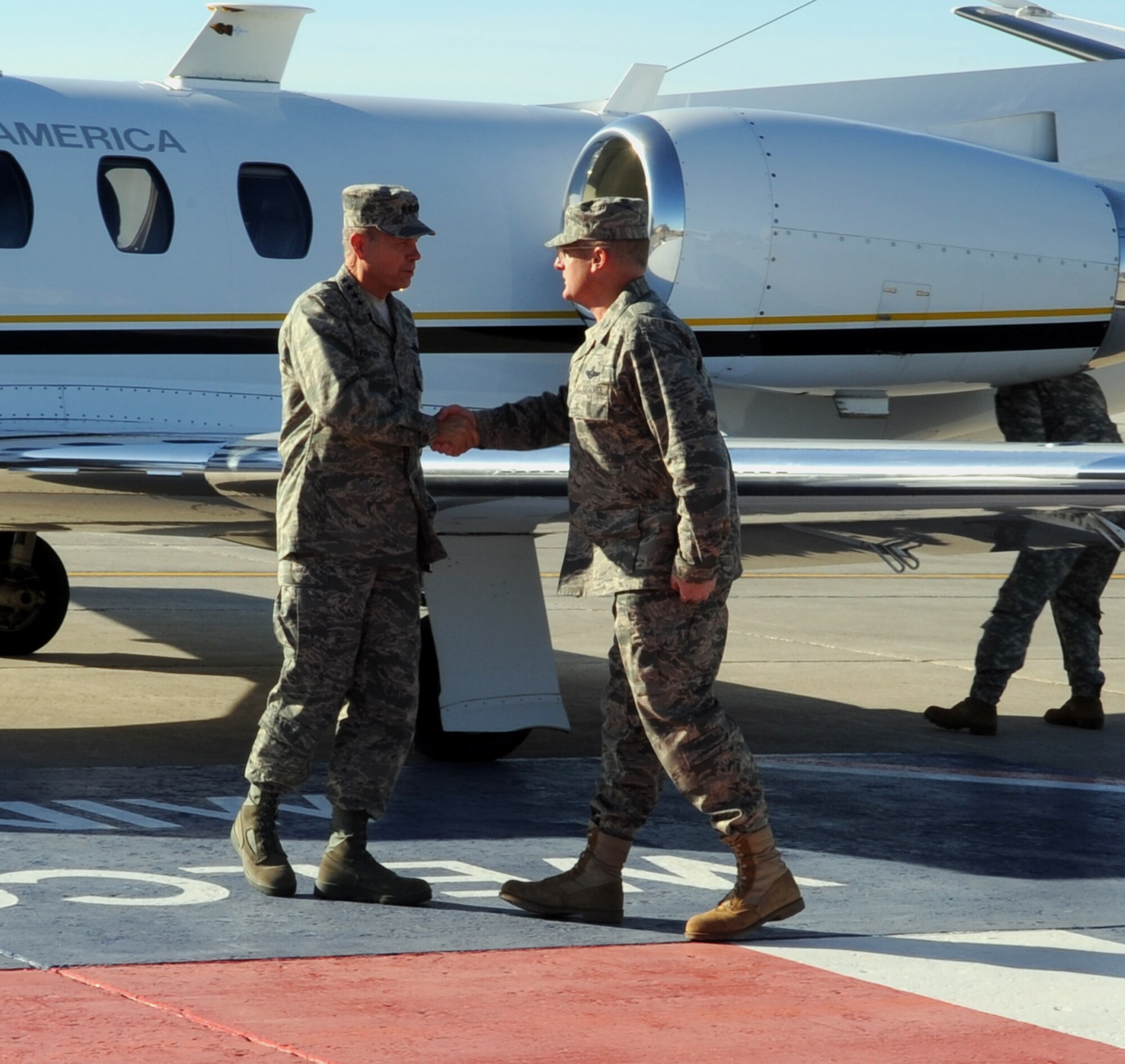 MINOT AIR FORCE BASE, N.D. -- Gen. William M. Fraser III, Air Combat Command commander, is greeted by Col. Douglas A. Cox, 5th Bomb Wing commander, as he arrives here Nov. 16. General Fraser visited Minot AFB to thank everybody for what they’re doing and to reemphasize the criticality of the mission at Minot. (U.S. Air Force photo by Senior Airman Michael Veloz)