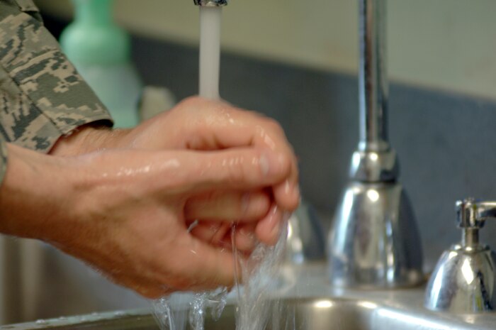 The Centers for Disease Control offers ways to protect against both the flu and H1N1 viruses. Wash hands often with soap and water. Avoid touching the eyes, nose or mouth. If experiencing flu-like symptom symptoms, stay home for at least 24 hours after the fever is gone except to get medical care or for other necessities. (U.S. Air Force photo/Staff Sgt. Marie Brown)