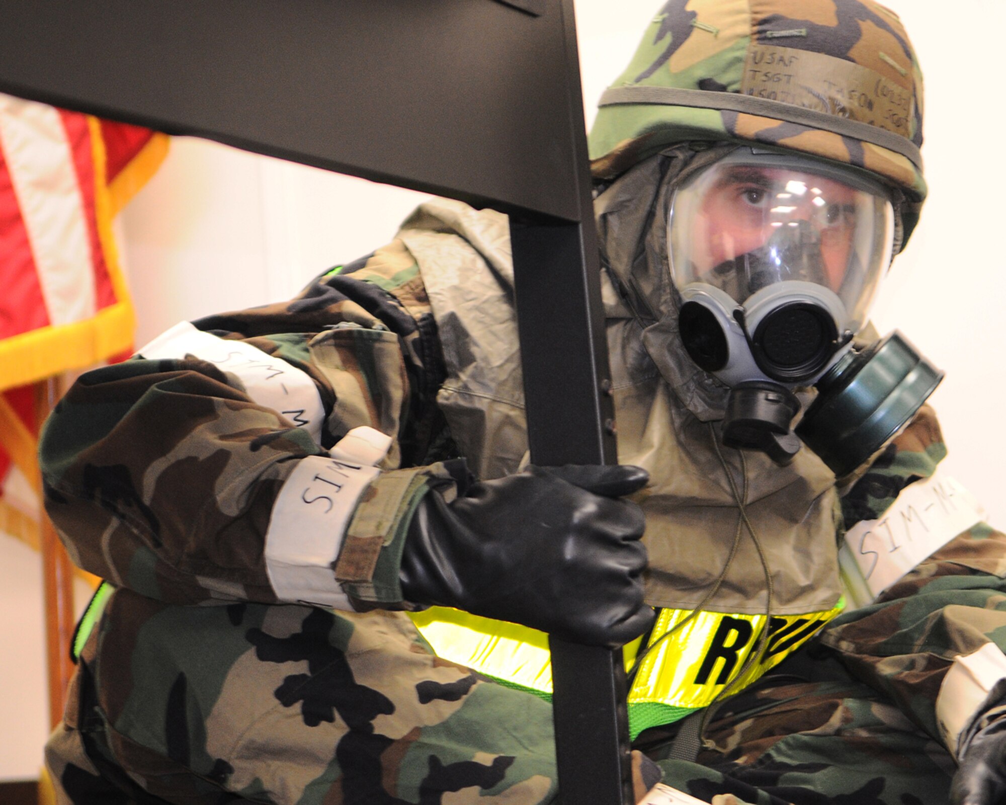 YOKOTA AIR BASE, Japan -- Technical Sgt. Jason Scott, 374th Airlift Wing Safety, seeks shelter during an attack on Yokota during Phase II of Exercise Beverly Morning 10-01. Yokota is conducting an exercise Nov. 18 through Nov. 20 to maintain operational readiness. (U.S. Air Force photo/Airman 1st Class Michael Dillon)