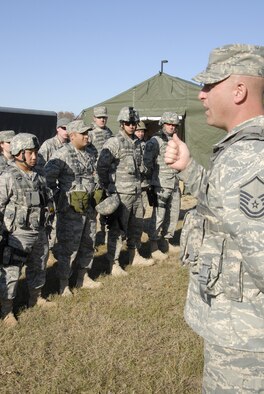 Master Sgt. Todd Weinberger, NCOIC of training for the 115th Fighter Wing Security Forces gives a brief prior to a combat patrol and convoy exercise at Volk Field, Air National Guard Base, Camp Douglas, Wis. Nov. 7, 2009. The Madison, Wis. based 115th Security Forces Squadron engaged in a variety of combat training exercises as part of their November Unit Training Assembly. (U.S. Air Force photo by Tech Sgt. Don Nelson)