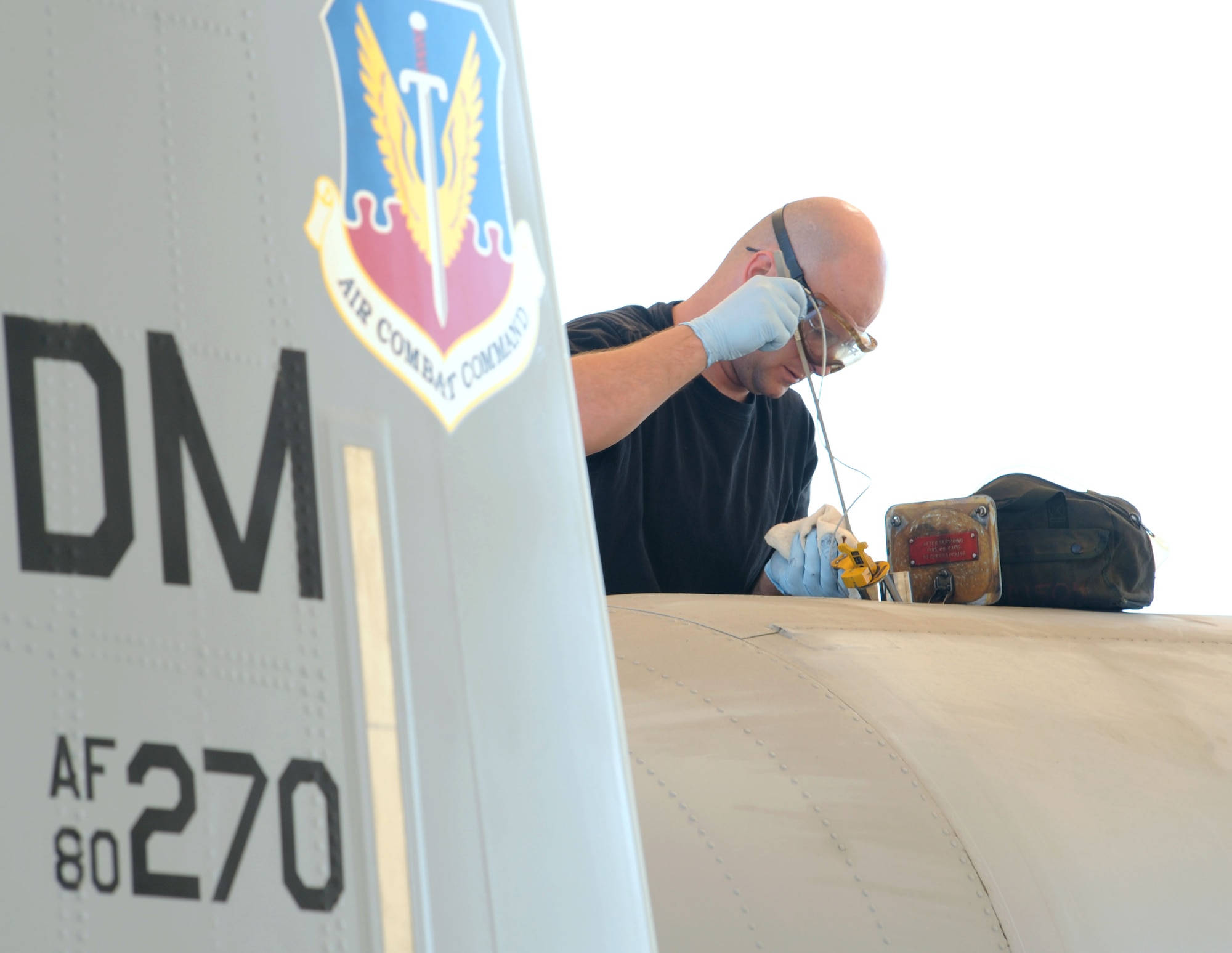 Staff Sgt. John Froehlich, a 355th Aircraft Maintenance Squadron dedicated crew chief, checks an A-10C's oil level after its first flight of the day. The 355th AMXS develops and executes a scheduled maintenance plan to maintain long-term fleet health, while providing aircraft to support worldwide contingency taskings. (U.S. Air Force photo/Staff Sgt. Valerie Smith)
